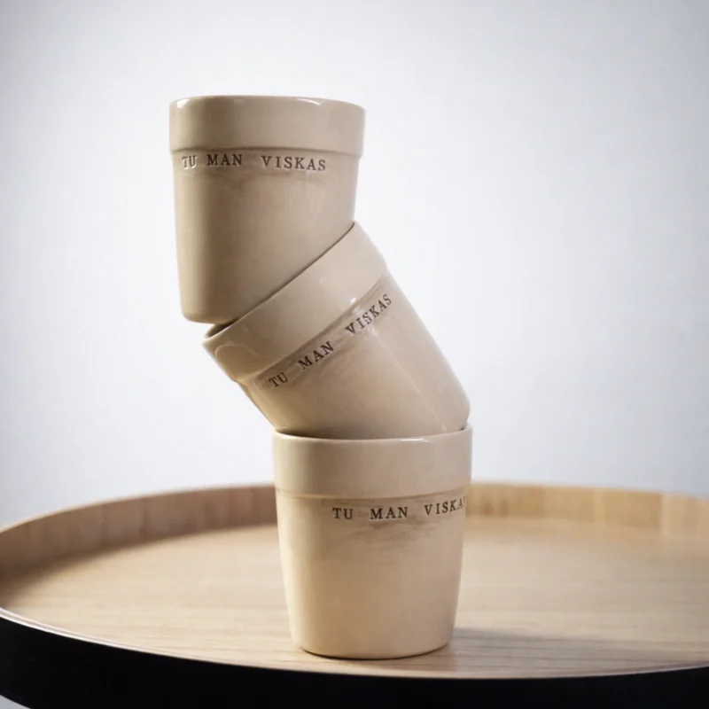 Puodelis su užrašu