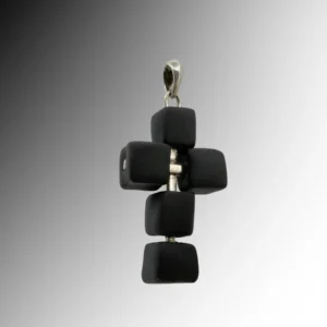 Silver cross pendant with black porcelain cubes strung on a silver structure