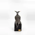Chamotte sculpture "Dignity" on a wooden base, front view